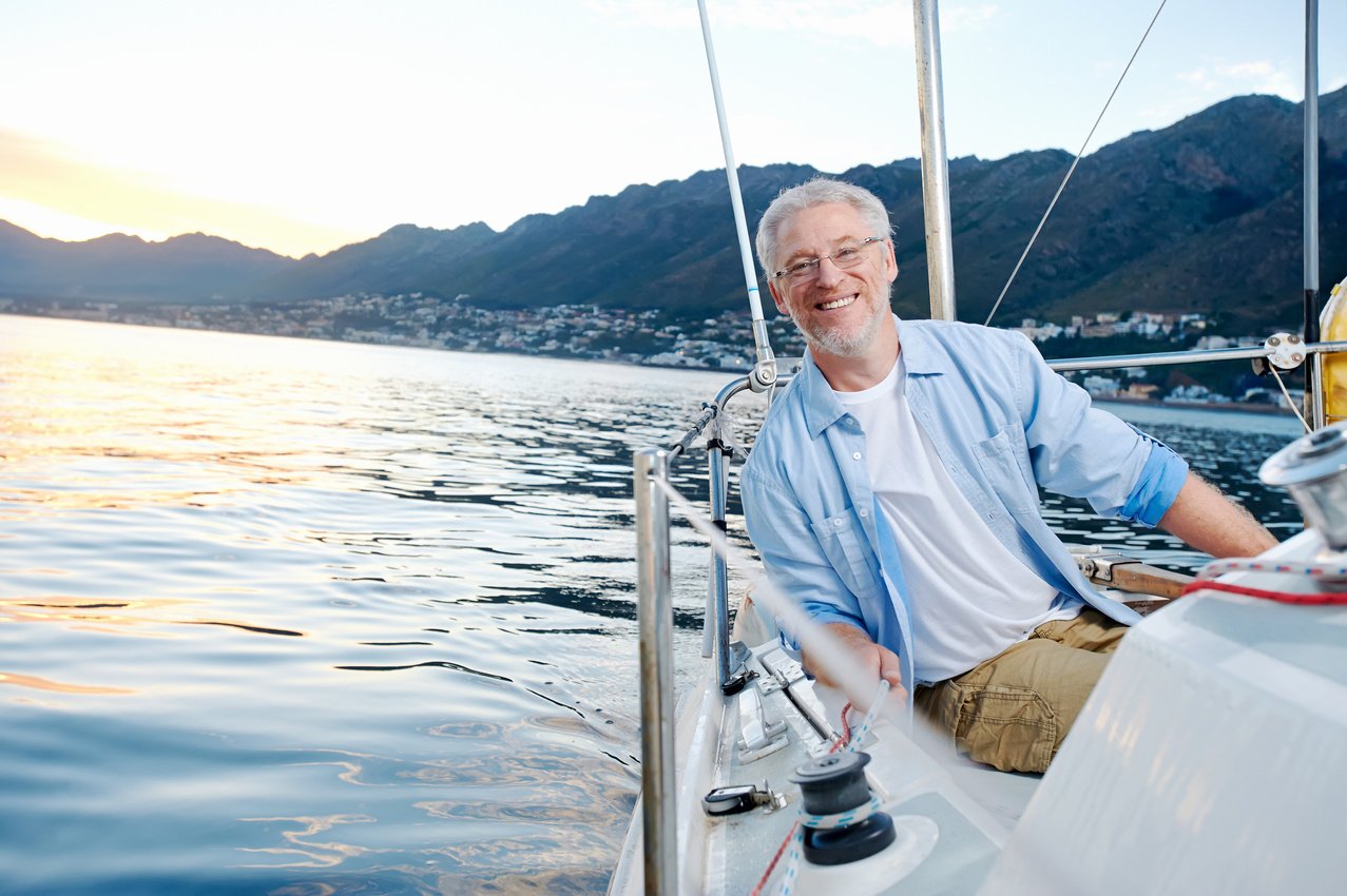 happy sailing man boat